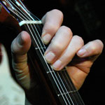 Guitar fingering for E chord by E.J. Gold